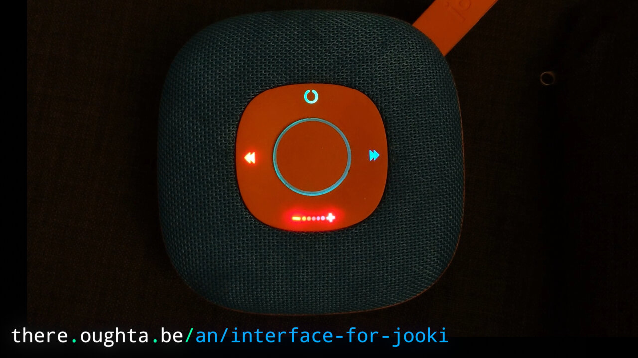 Thumbnail of a youtube video showing the Jooki with colorful glowing LEDs.