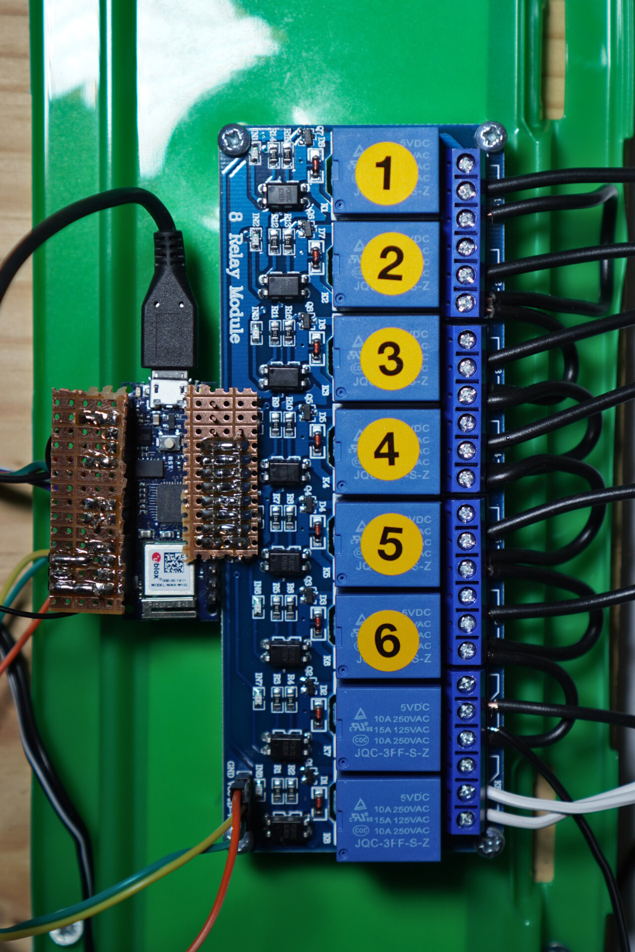 Photo of the Arduino soldered to a relay board.