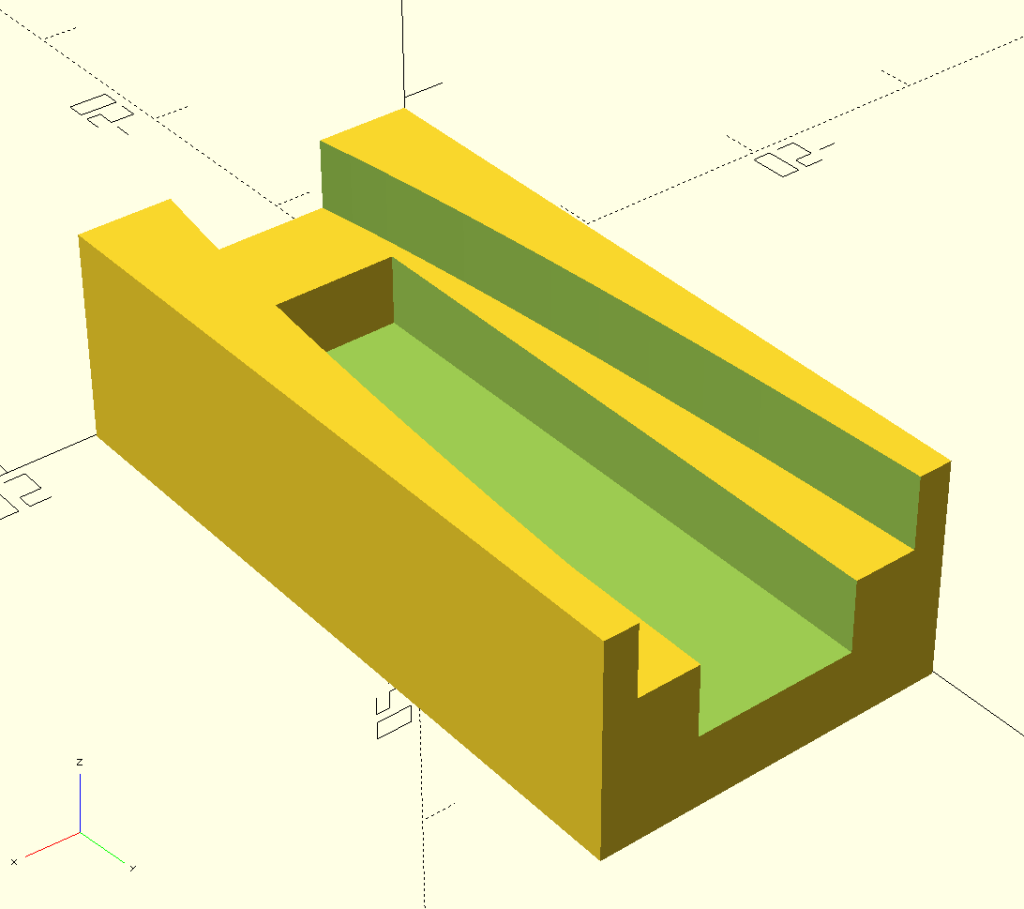 Screenshot of a track piece in OpenSCAD. The image shows coordinate axes and markers for scale, but the main feature of the image is the track piece itself. It has the shape of a 4 by 2 Lego brick, but the top is flat with a widening gap in which the marble can run. Below the gap in the top layer is another layer with a smaller gap, which is the track on which the marble runs once the upper track has widened enough for the marble to reach the lower one.